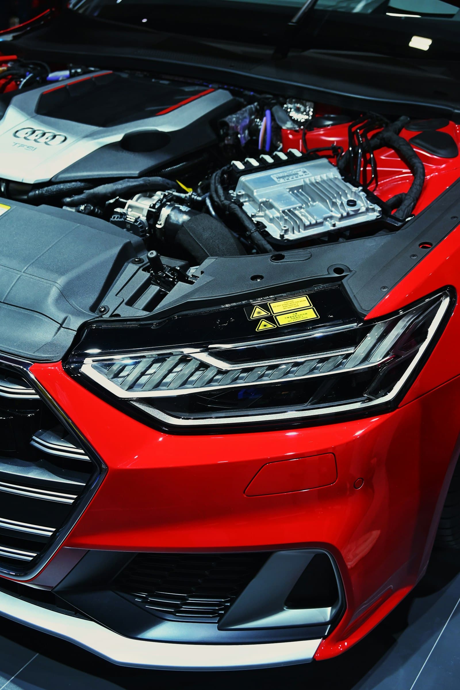 Crystal-clear LED headlight on a red car